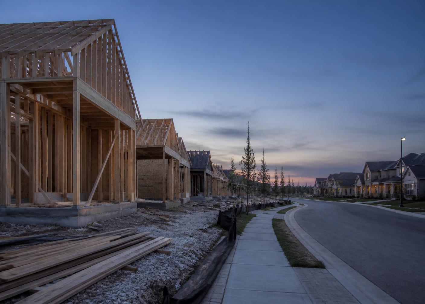 New residential neighborhood under construction at dusk in North Texas